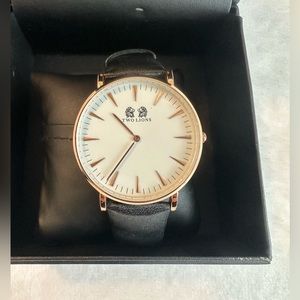 Two Lions $399 watch. Never worn but has wear at end of band, switch band out.